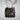 Chanel 22 Mini Handbag in Shiny Calfskin & Gold-Tone Metal in Colour Black